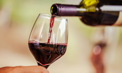 Wine being poured in a glass